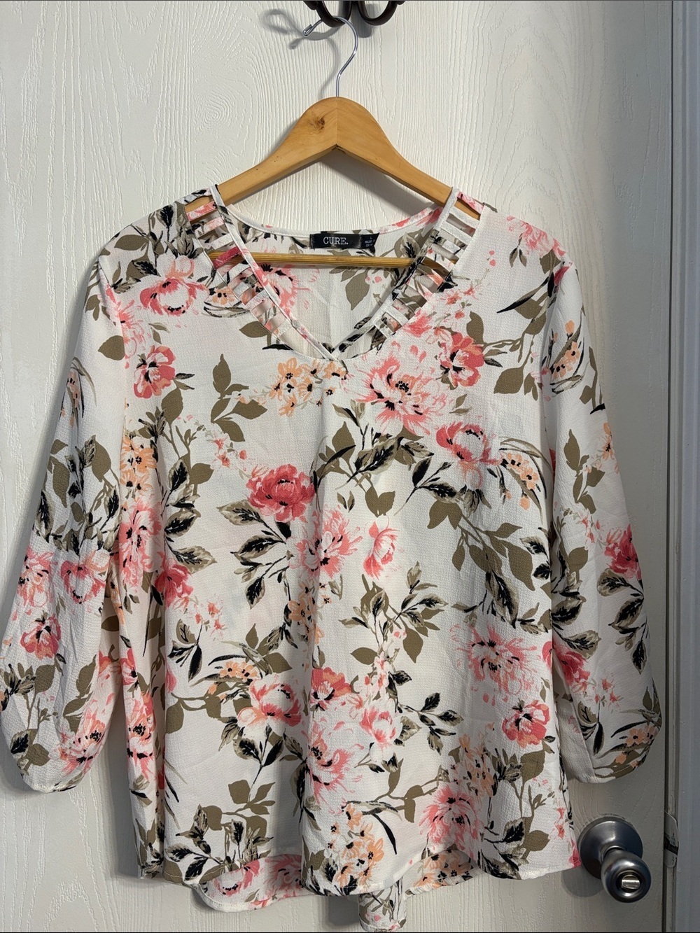 Cutout V-Neck Floral Blouse in White with Pink Blossoms